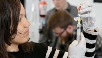 A Columbia medical student practices her skills in the Simulation Center.